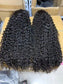 Jerry Curl 4x4 Closure Wig - 180%/210% Density, Natural Black - worn on a model, front view of the long jerry curl closure wig