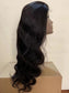 Body Wave 4x4 Closure Wig - 180%/210% Density, Natural Black - back view of the long body wave wig on a cardboard box showing loose waves