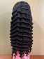 Deep Wave 4x4 Closure Wig - 180%/210% Density, Natural Black - back view of the deep wave closure wig laid flat, showing the rippled texture